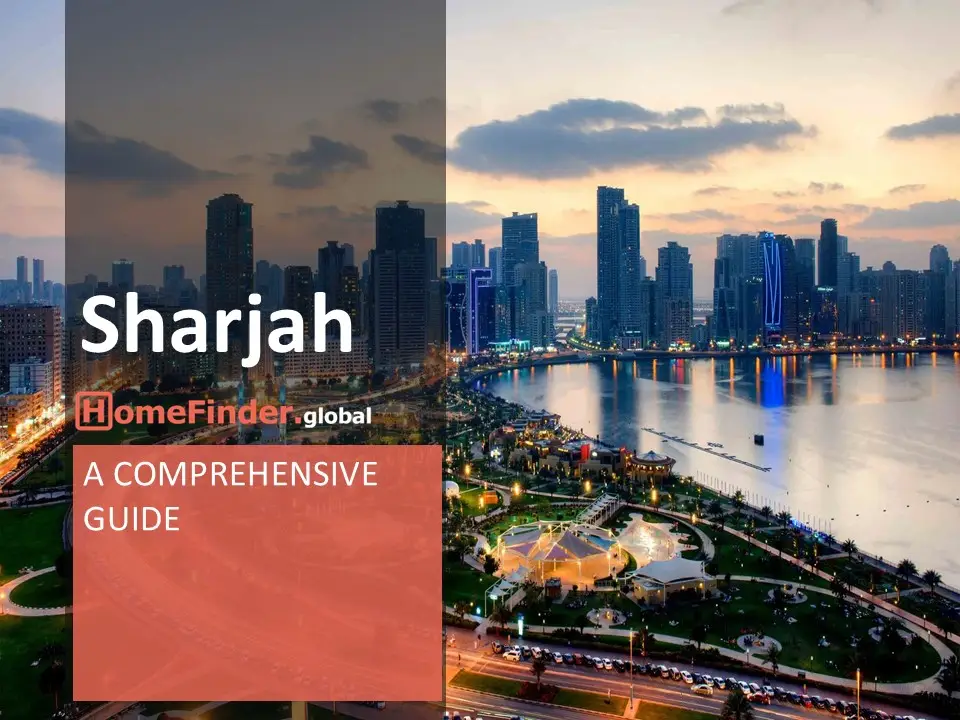 This image features the cover of a comprehensive guide to Sharjah, presented by HomeFinder Global. It showcases an evening view of Sharjah’s Al Majaz Waterfront with its beautifully lit skyline and reflective waterfront. The prominent text "Sharjah" is displayed, followed by "HomeFinder.global" and the subtitle "A Comprehensive Guide." The warm tones of the setting sun and city lights create an inviting atmosphere, highlighting the urban charm of Sharjah.