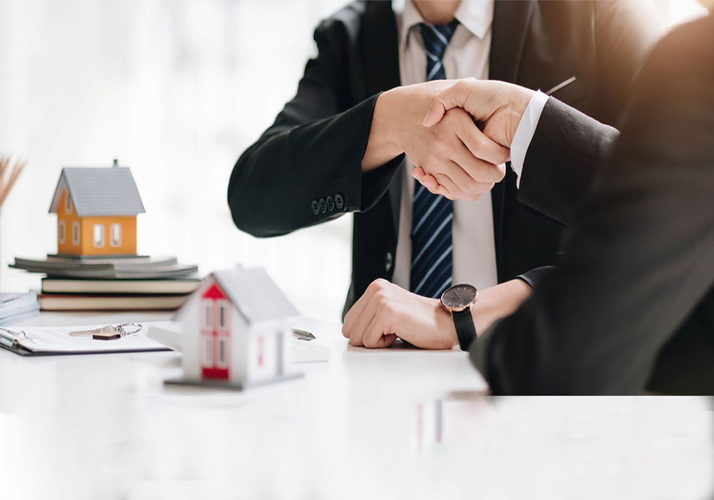 A professional handshake over a contract, symbolizing trust and partnership in real estate consultancy, with a focus on Dubai's property market.