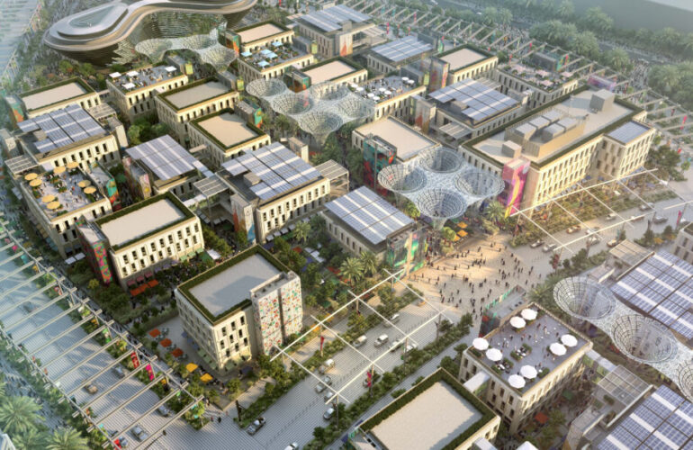 A photo of the top view of the Al Waha Residences town, where there are many houses and townhouses that are stacked together.