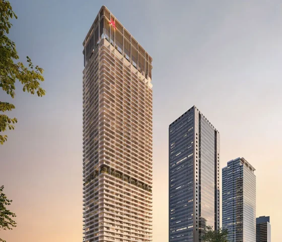 Marriott-Residences-at-JLT- front view High-rise apartments with facades in navy and silver colors, featuring mesh window screens