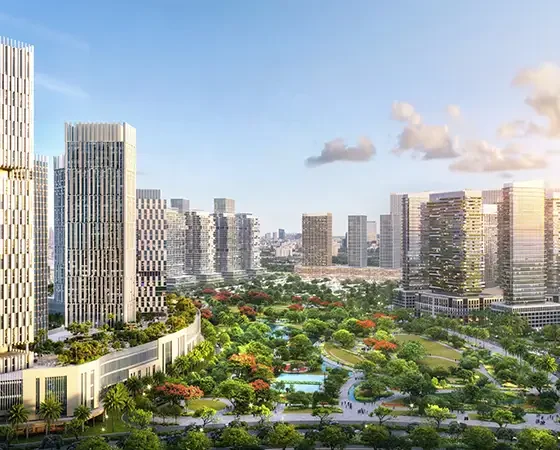 Panoramic aerial view of Azizi Milan Tower Dubai surrounded by lush landscaping and modern towers in Dubai.