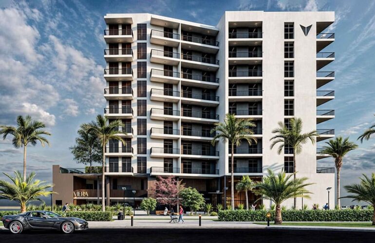 Stylish multi-storey façade with private balconies and lush landscaping at Viera Residences in Dubai.