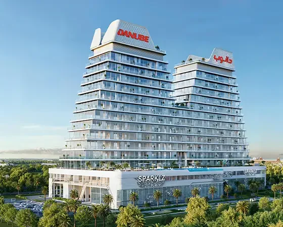 Iconic curved towers of Sparklz by Danube Dubai with sleek glass façade and signature branding.