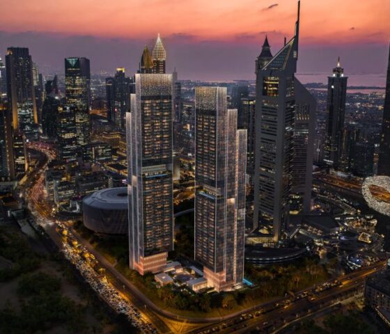 Emirates Towers by Meraas – High-rise towers at dusk with pool view