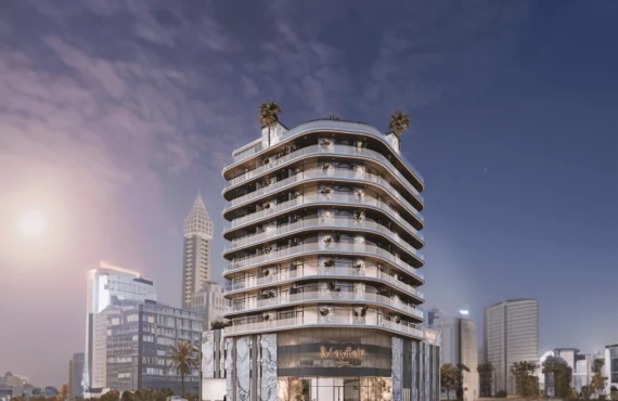 Mayfair Gardens Dubai – Night view of building with city skyline