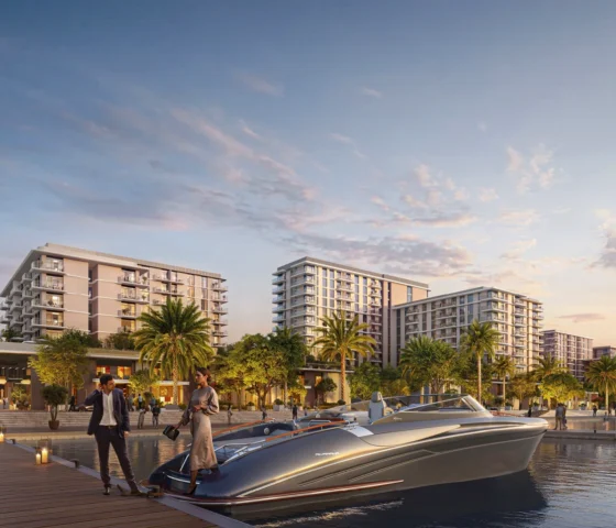 Pier Point 2 Waterfront promenade with low-rise buildings and luxury boats at Pier Point 2