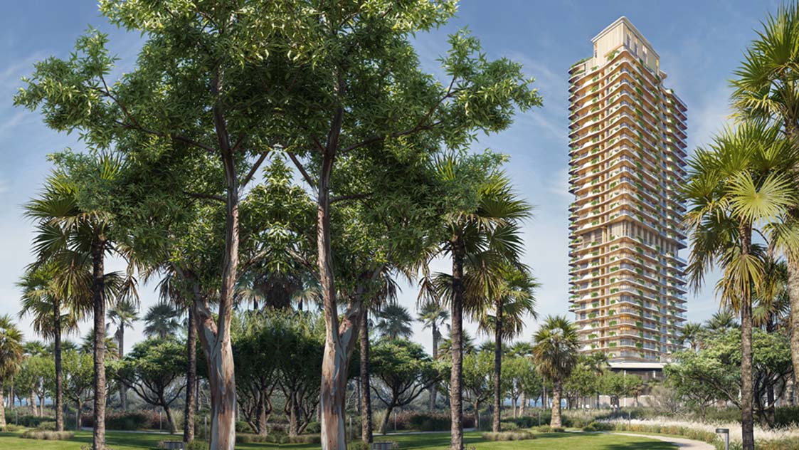 Palm-lined entrance to The Mural by Beyond in Dubai with coastal tower views