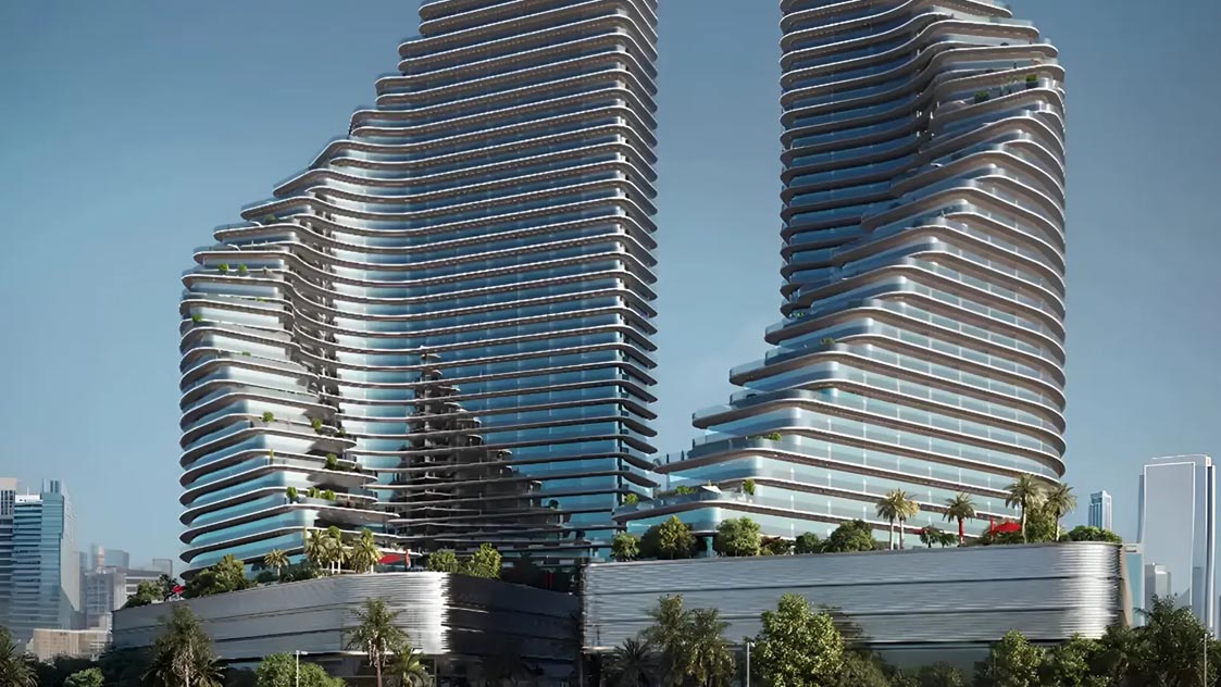Exterior view of the twin towers of Binghatti Flare in Dubai, showcasing their unique architectural design under a clear sky.