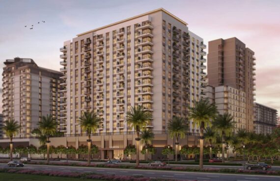 Modern high-rise towers of Camden project in Dubai at sunset