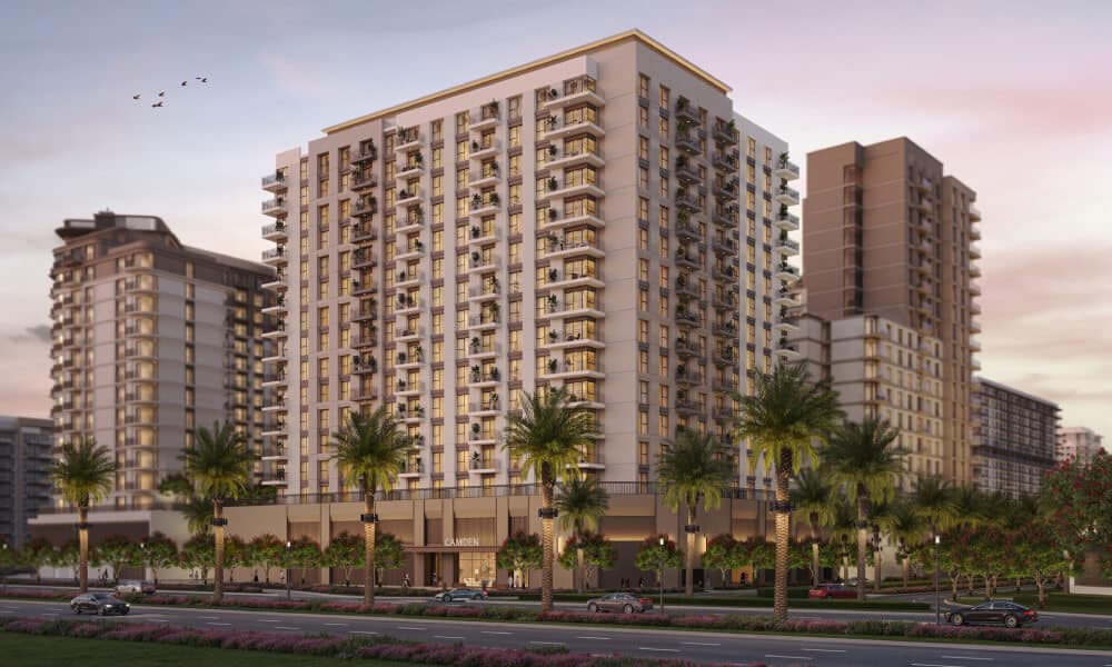 Modern high-rise towers of Camden project in Dubai at sunset