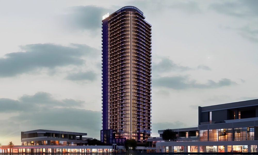 Night view of MBL Signature residential tower in Dubai with modern architectural design