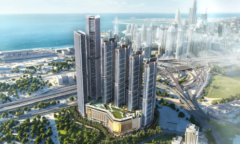 Aerial view of The Horizon towers with Dubai skyline and coastline in the background