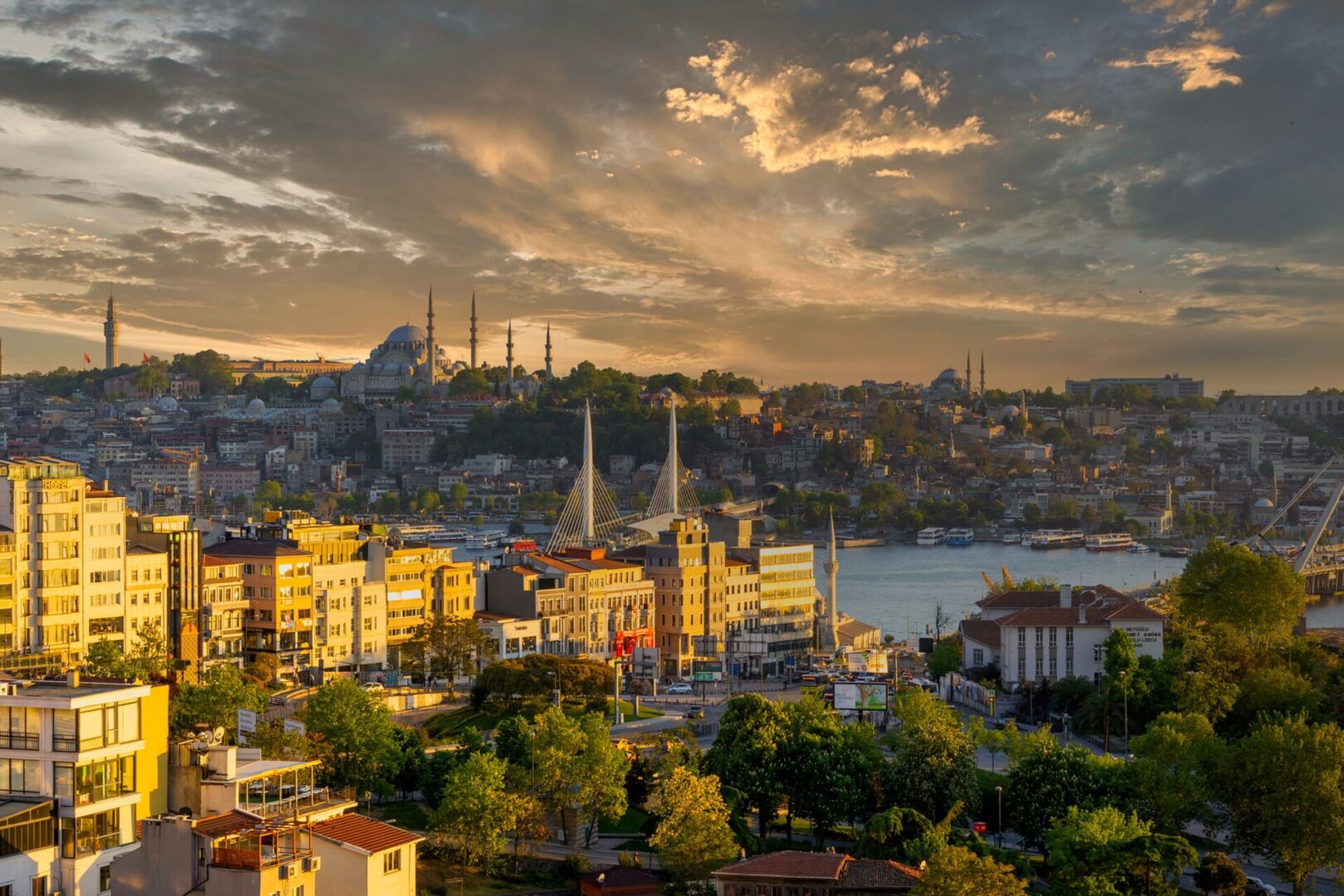 Istanbul, Turkey skyline at sunset with the Golden Horn Bridge, representing Turkey's real estate market