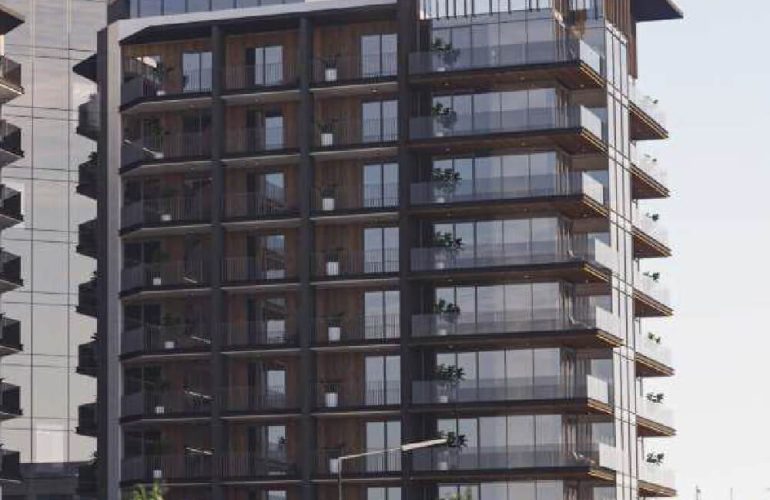 A photo of an apartment facing a swimming pool