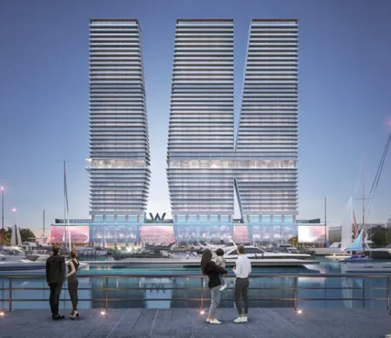 A photo of 3 penthouses that are next to each other like the letter w