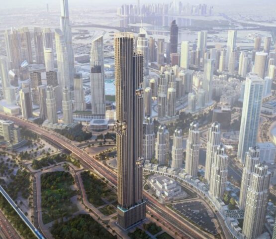 Drone shot of DWTN Residences skyscraper among Dubai skyline