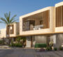 A row of modern villas in the Al Tay Hills community in Dubai, featuring spacious balconies and green surroundings.