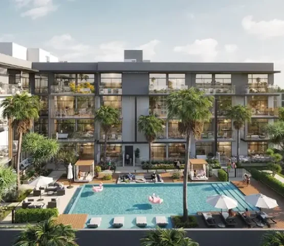 A striking architectural view of Oxford Terraces 2, featuring a sleek residential design with a luxurious poolside setting in Dubai.