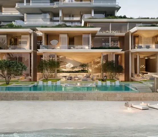 Striking exterior of ORLA Infinity in Dubai featuring multi-level modern architecture and serene poolside design.