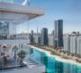 Private balcony at Ayaan Heights overlooking the lagoon and Dubai skyline