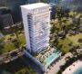 view of Ayaan Heights residential tower with illuminated façade and poolside