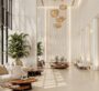 Luxurious lobby with high ceilings, modern furniture, and large glass windows at Ayaan Heights