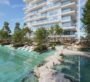 Crystal lagoon with landscaped greenery and outdoor seating areas at Ayaan Heights