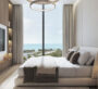 Bright and elegant bedroom at Bayfront Marina Residences in Dubai, offering a stunning oceanfront view.