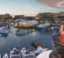 Balcony view of the marina at Bayfront Marina Residences in Dubai during sunset, overlooking boats and the promenade.