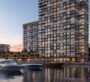 View of the Baystar by Vida residential tower in Dubai located along the marina waterfront with yachts docked nearby.