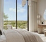 Contemporary living room with park views at Vida Residences Hillside Dubai