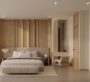 Cozy and well-lit bedroom at Binghatti Flare, Dubai, designed with soft tones and elegant furnishings.