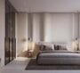 Refined master bedroom in Binghatti Flare, Dubai, with large windows allowing natural light to fill the space.