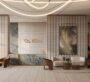 Sophisticated lobby interior at Binghatti Flare, Dubai, featuring artistic wall décor and modern furniture.