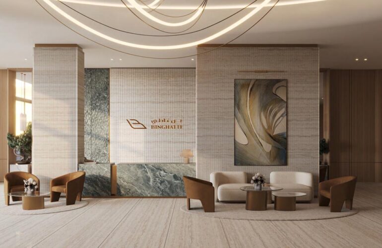 Sophisticated lobby interior at Binghatti Flare, Dubai, featuring artistic wall décor and modern furniture.