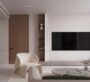 Sleek and minimalist living room design in Binghatti Flare, Dubai, featuring neutral tones and a large flat-screen TV.