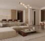 Twin-bed suite at Binghatti Flare, Dubai, offering a built-in sitting space and warm, neutral interiors.
