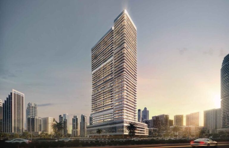 Exterior view of Binghatti Hillviews tower at sunset in Dubai skyline
