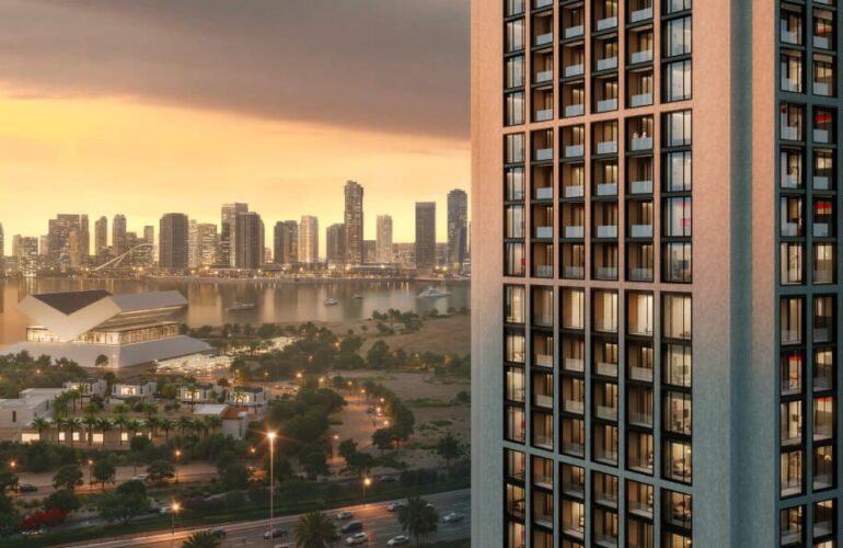 Sunset over Dubai city skyline viewed from Binghatti Twilight with high-rise buildings in the background.