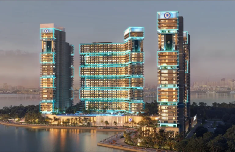 Chelsea Residences – Towers with night lighting near the bay