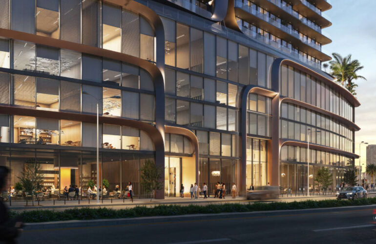 Modern curved glass facade of Voxa by Pantheon from street level