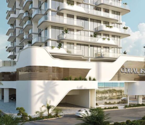 Contemporary architectural design of Coral Isle Residences Dubai featuring flowing white lines and sculpted balconies.