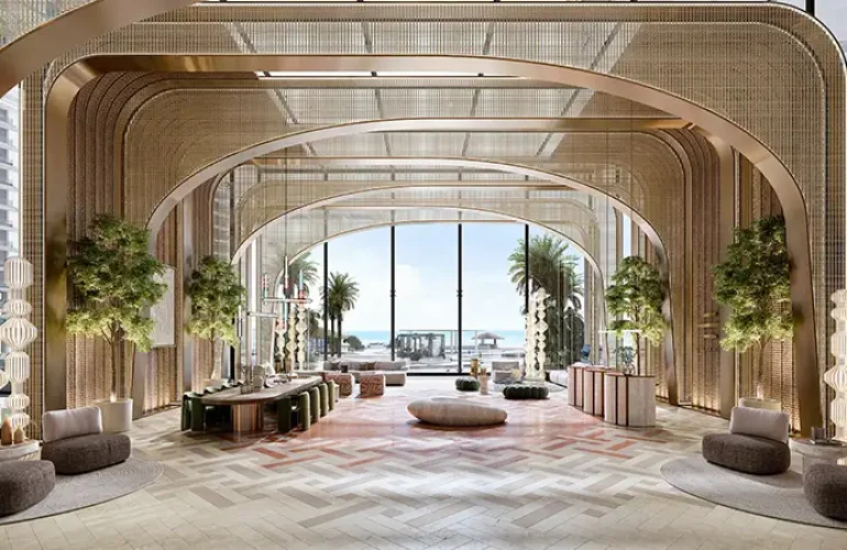 Costa Mare at Al Marjan – Luxurious lobby reception with wood accents