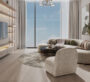Contemporary lounge space in Cove Edition 6, Dubai, featuring curved furniture and a neutral, inviting color palette.
