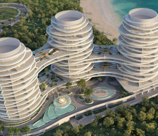 Full aerial masterplan of La Mer Dubai featuring three sculptural ELIE SAAB towers and a central lagoon-style pool.
