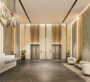 Modern and luxurious lobby area with seating and elevators at Samana Hills South