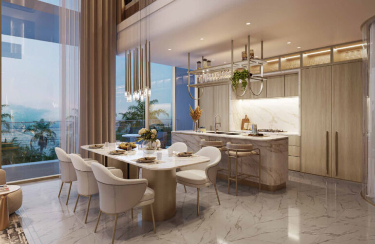Luxurious dining area and kitchen with sea view at Beach Walk Grand in Dubai