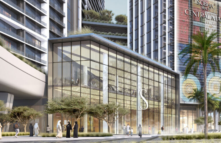 Grand retail and lobby entrance at Sobha Central with glass façade