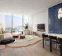 Living room with work desk and modern furnishings at Dubai Harbour Residences