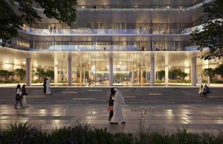 Illuminated main entrance of Dubai Harbour Residences at night